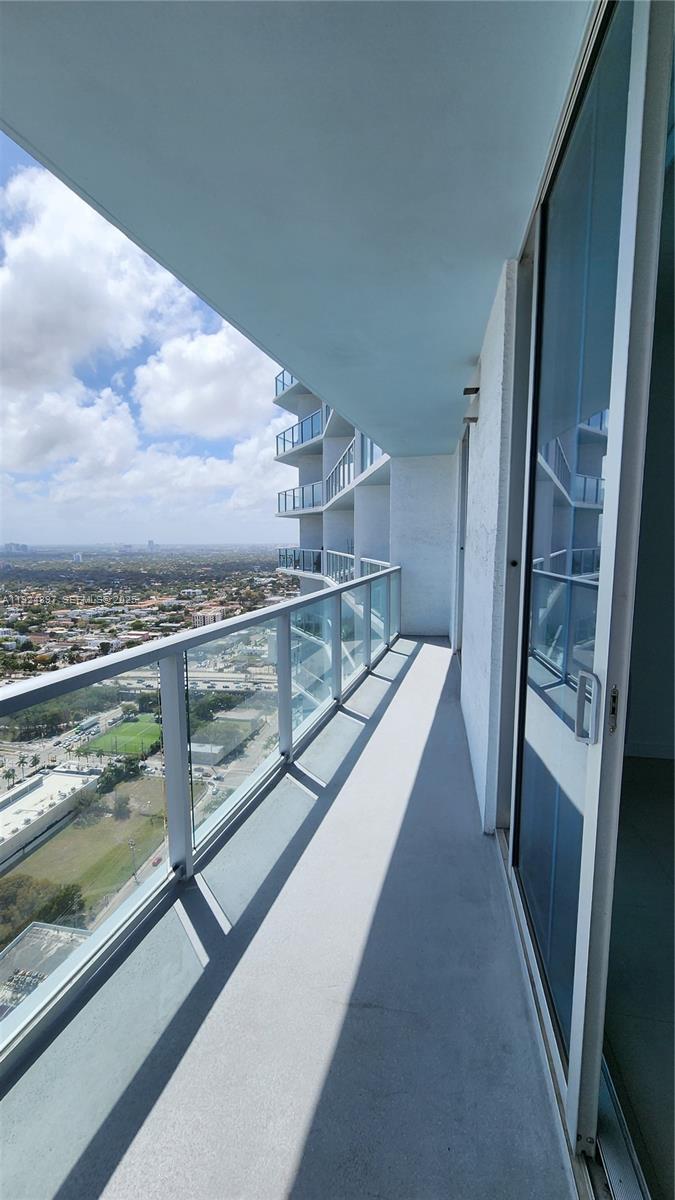 185 Southwest 7th Street, Unit 3814 Miami, FL 33130 - Photo 14 of 17 The large balcony offers enough space for outdoor furniture. In addition, the balcony can be accessed from both the living room and the bedroom.