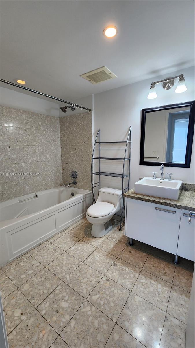 185 Southwest 7th Street, Unit 3814 Miami, FL 33130 - Photo 9 of 17 Beautiful and modern bathroom. The marble flooring gives it a stylish and modern aesthetic.