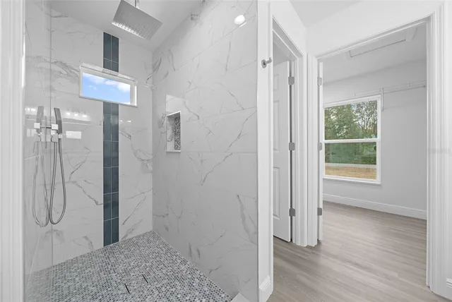 a view of a bathroom with a shower