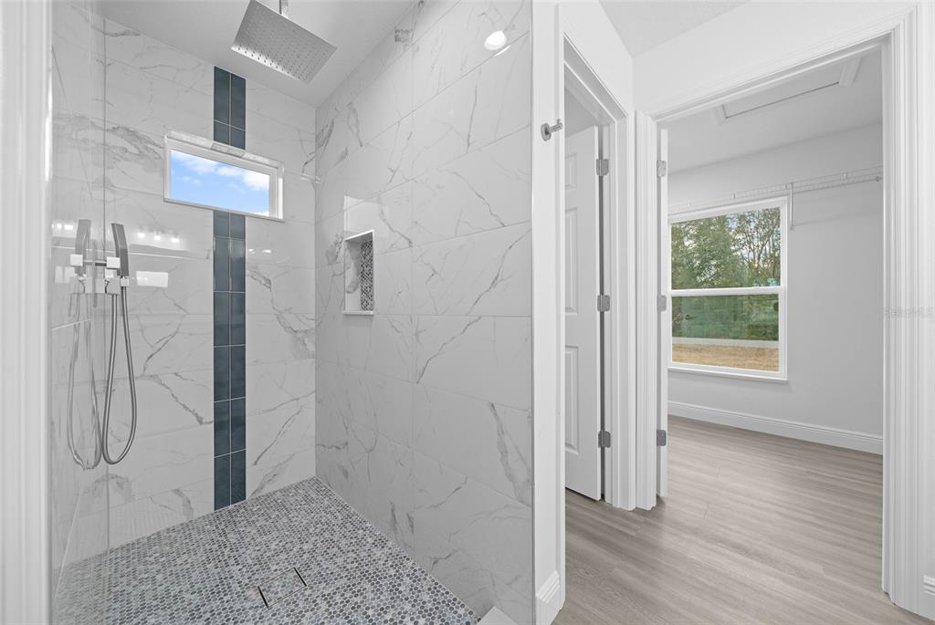 7 Walnut Place Ocala, FL 34480 - Photo 22 of 39 a view of a bathroom with a shower