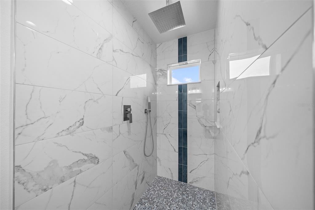 7 Walnut Place Ocala, FL 34480 - Photo 23 of 39 a bathroom with a shower