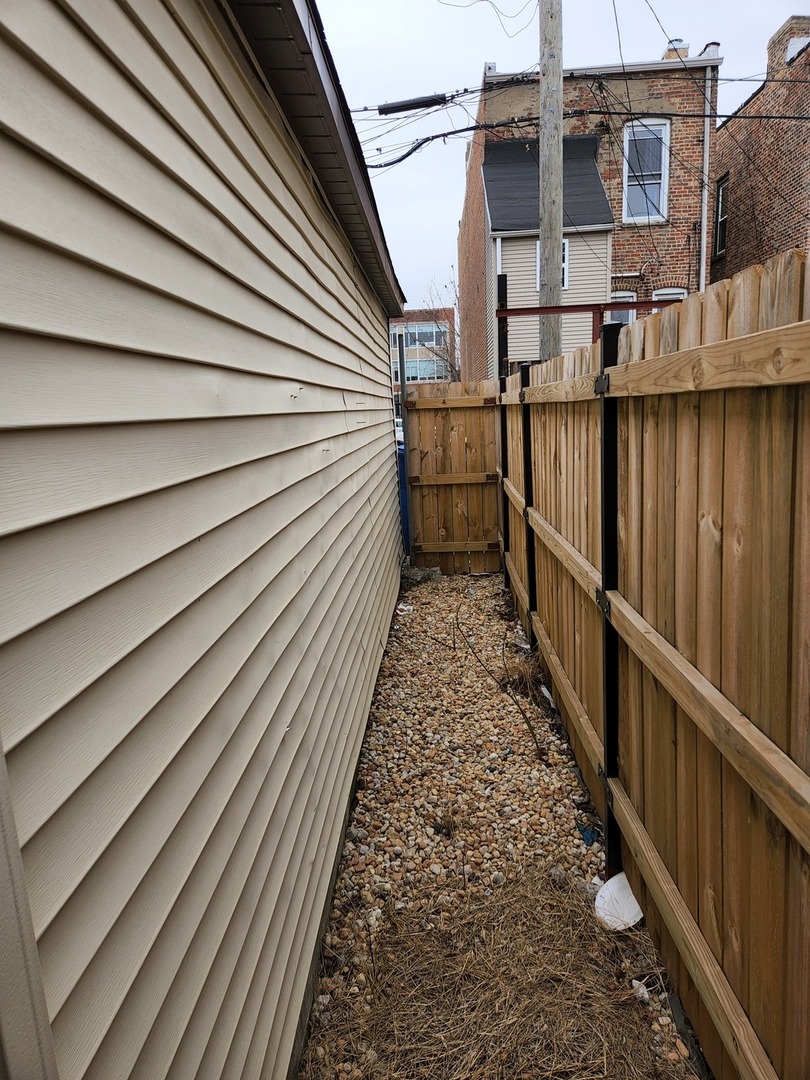 2663 West Maypole Avenue Chicago, IL 60612 - Photo 13 of 15 a view of a house with wooden floor