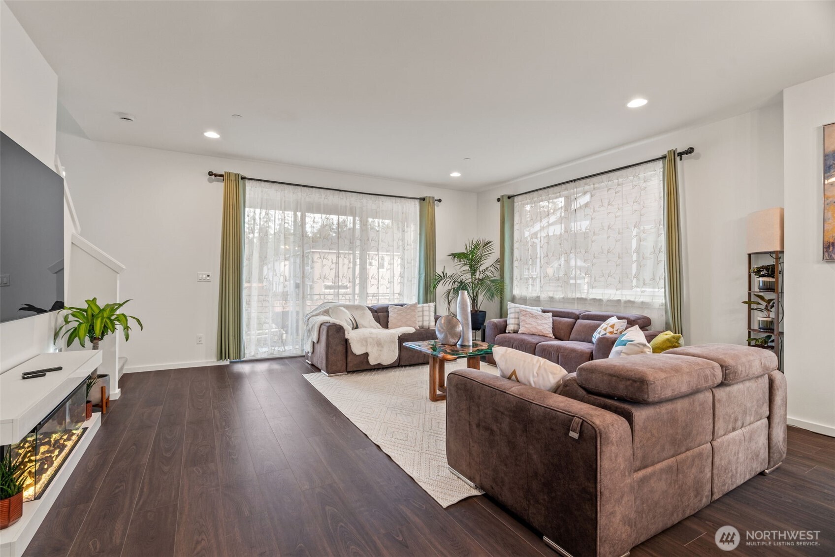 3915 198th Street Southeast, Unit F4 Bothell, WA 98012 - Photo 17 of 38 a living room with furniture and a large window