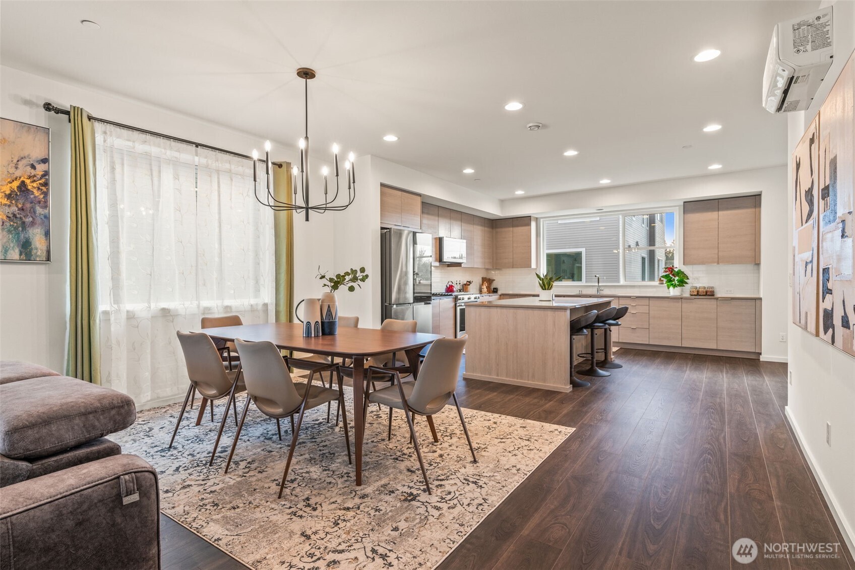 3915 198th Street Southeast, Unit F4 Bothell, WA 98012 - Photo 18 of 38 a view of a dining room with furniture window and wooden floor