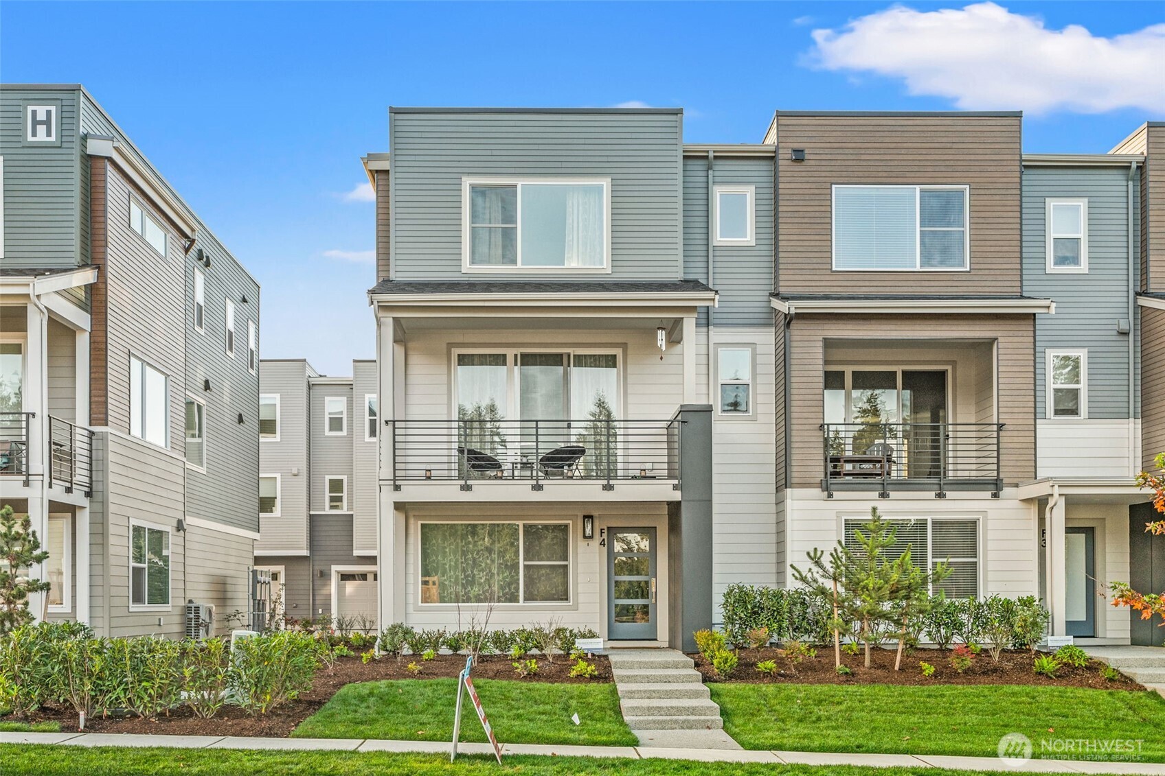 3915 198th Street Southeast, Unit F4 Bothell, WA 98012 - Photo 2 of 38 front view of a brick house