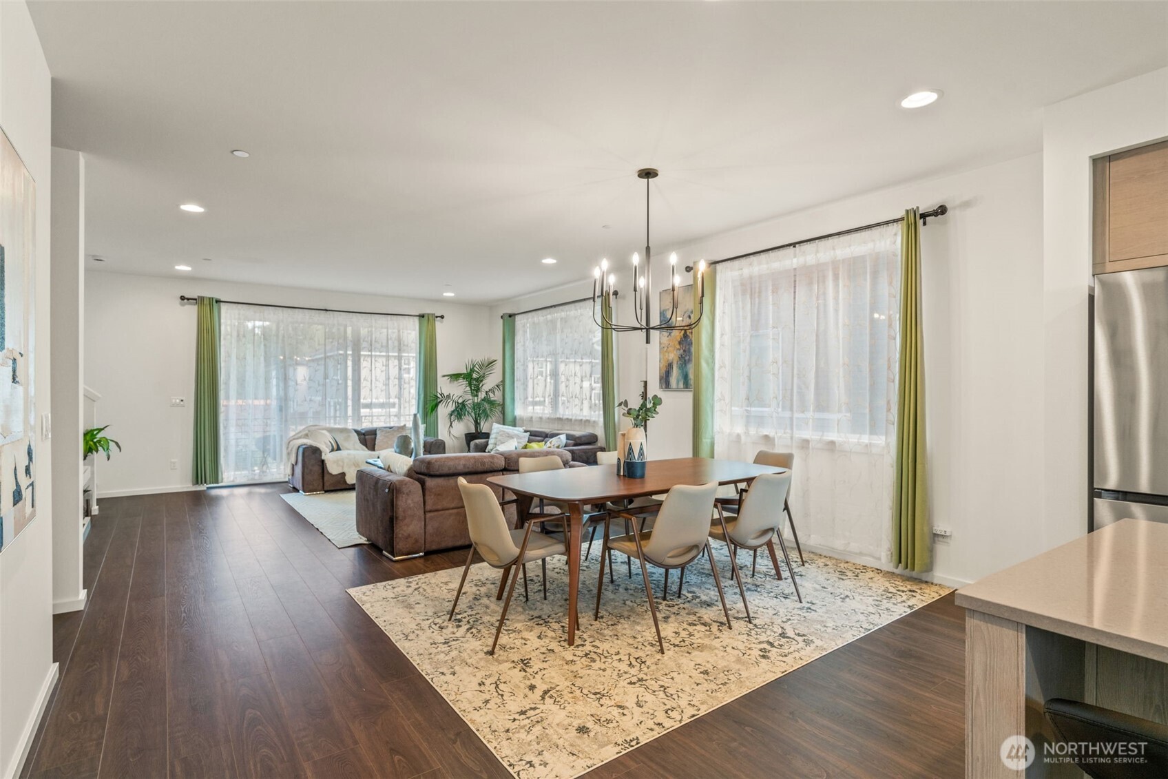 3915 198th Street Southeast, Unit F4 Bothell, WA 98012 - Photo 26 of 38 a view of a dining room with furniture window and wooden floor