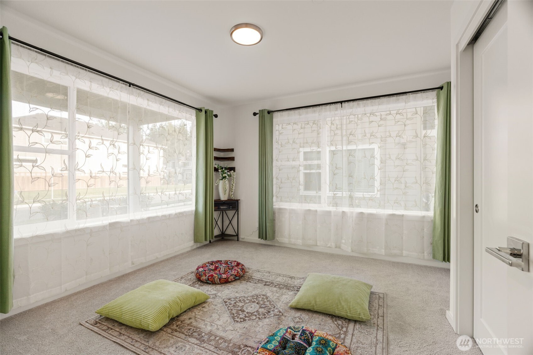 3915 198th Street Southeast, Unit F4 Bothell, WA 98012 - Photo 28 of 38 a bedroom with a bed and a window