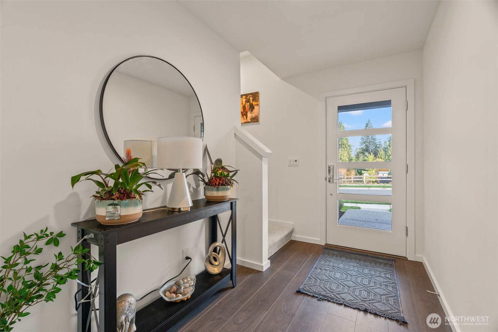 3915 198th Street Southeast, Unit F4 Bothell, WA 98012 - Photo 29 of 38 a room with table and flowerpot