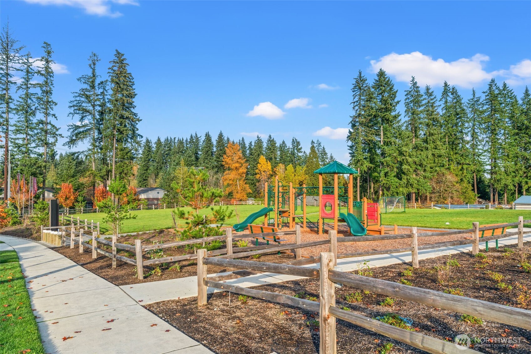 3915 198th Street Southeast, Unit F4 Bothell, WA 98012 - Photo 4 of 38 a view of a park with large trees
