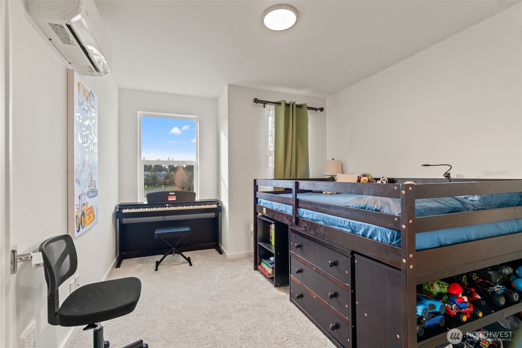 3915 198th Street Southeast, Unit F4 Bothell, WA 98012 - Photo 6 of 38 a bed room with a bed and a chair