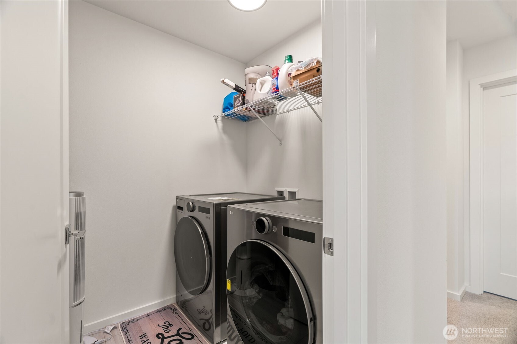 3915 198th Street Southeast, Unit F4 Bothell, WA 98012 - Photo 8 of 38 a view of storage and utility room with washer and dryer