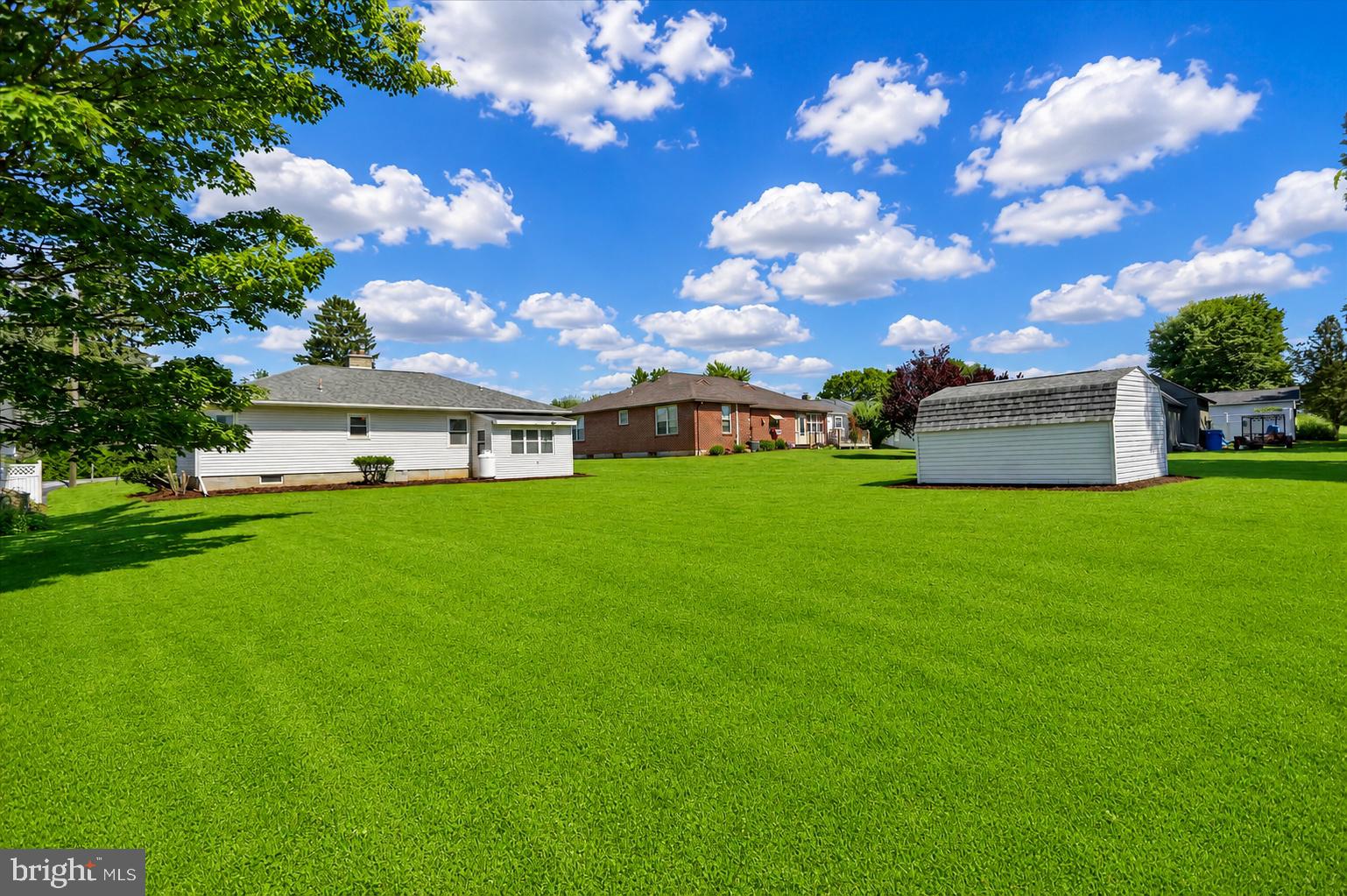 4287 Old Us-322 Reedsville, PA 17084 - Photo 31 of 33 Spacious lawns under a bright sky.