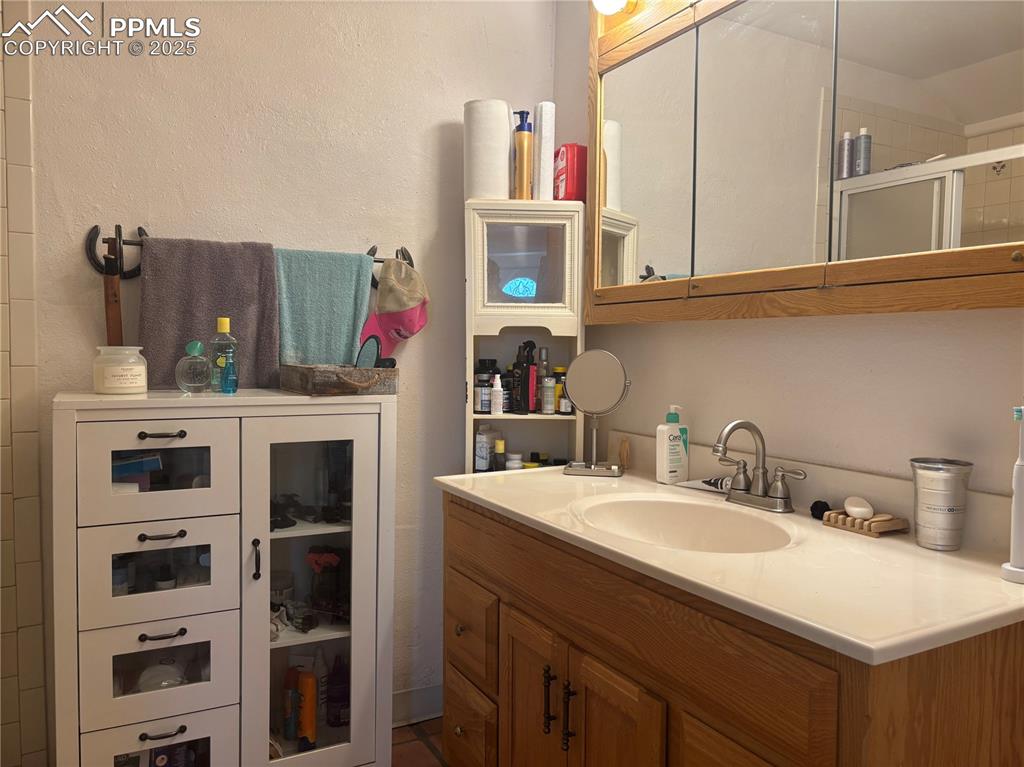 201 Terry Lane Guffey, CO 80820 - Photo 16 of 25 a kitchen with stainless steel appliances a sink and cabinets
