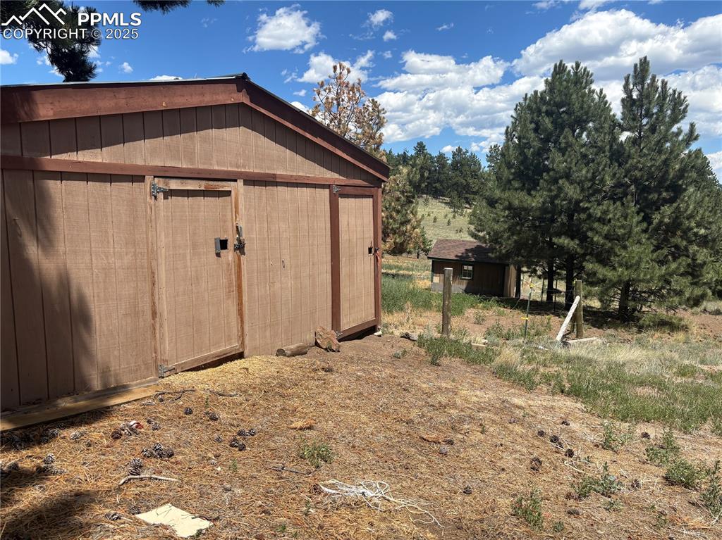 201 Terry Lane Guffey, CO 80820 - Photo 20 of 25 a view of a house with a yard