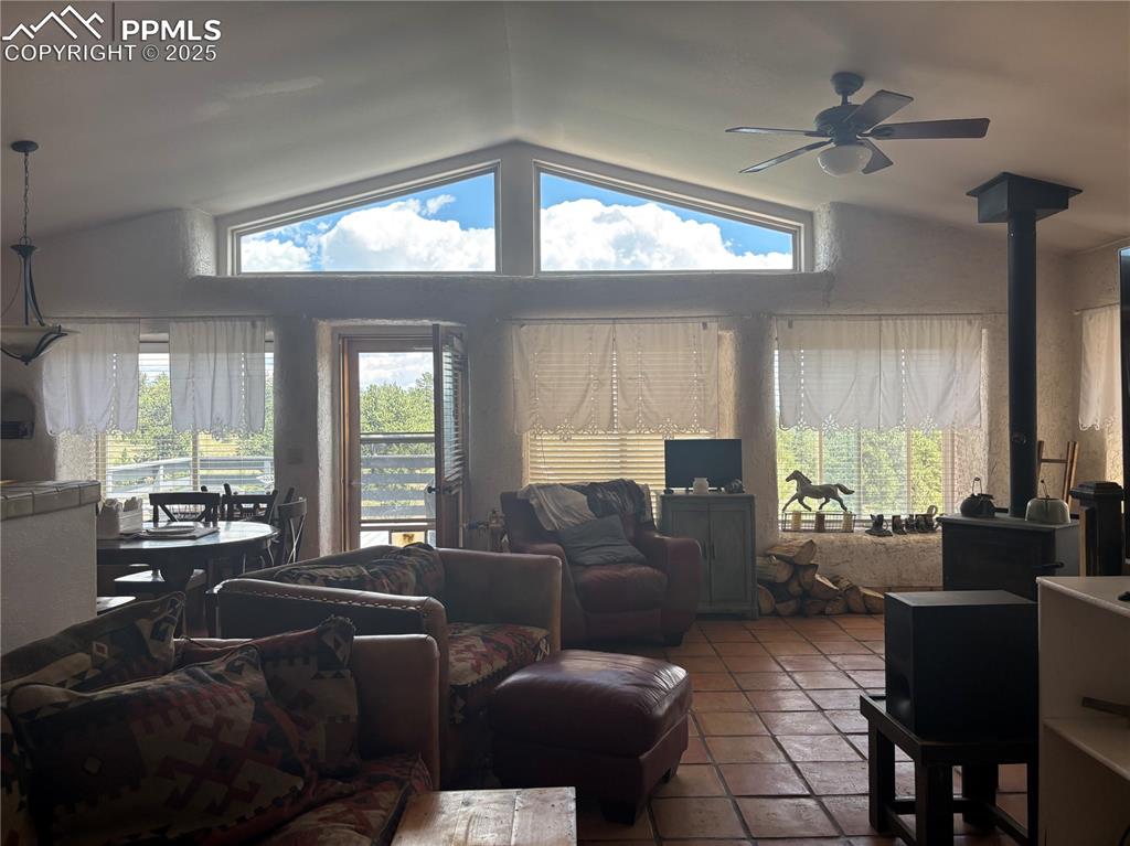 201 Terry Lane Guffey, CO 80820 - Photo 3 of 25 a living room with furniture and a large window
