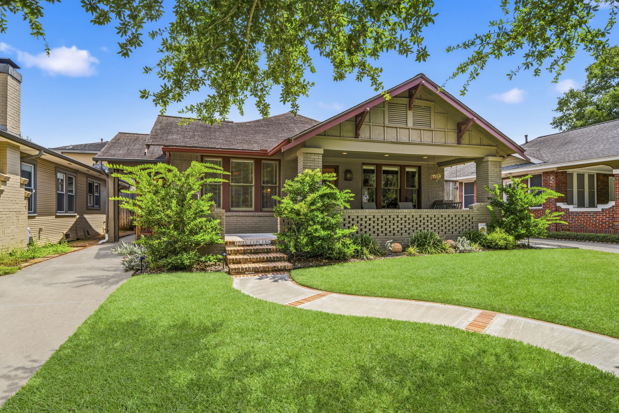 1521 Kipling Street Houston, TX 77006 - Photo 4 of 35 Charming bungalow with a cozy front porch, featuring a well-maintained lawn and mature landscaping. The exterior showcases classic architectural details and a welcoming pathway leading to the entrance. Ideal for those seeking a blend of character and comfort.