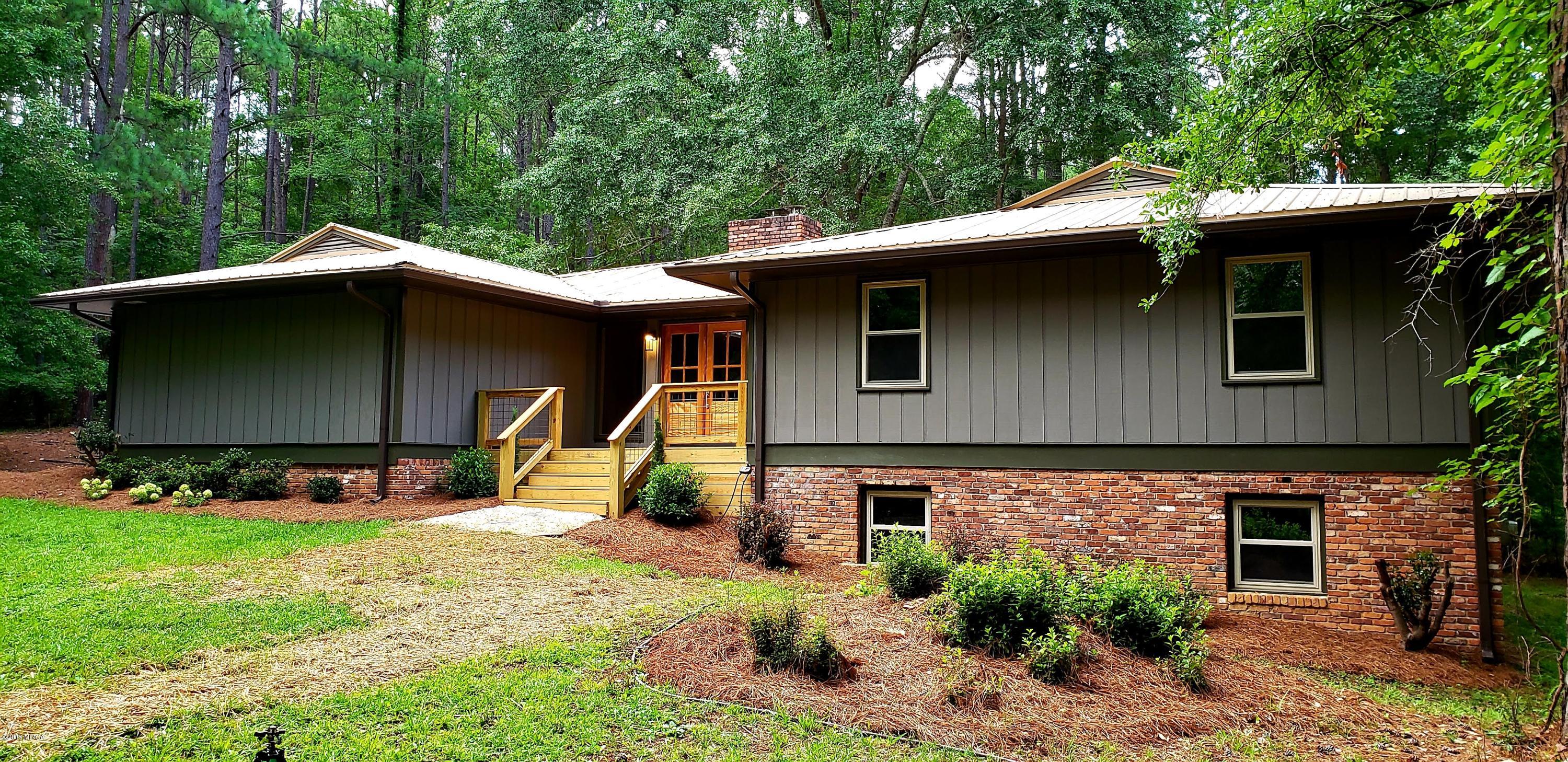 259 Greenwood Road Gray, GA 31032 - Photo 25 of 29 a view of a house with backyard