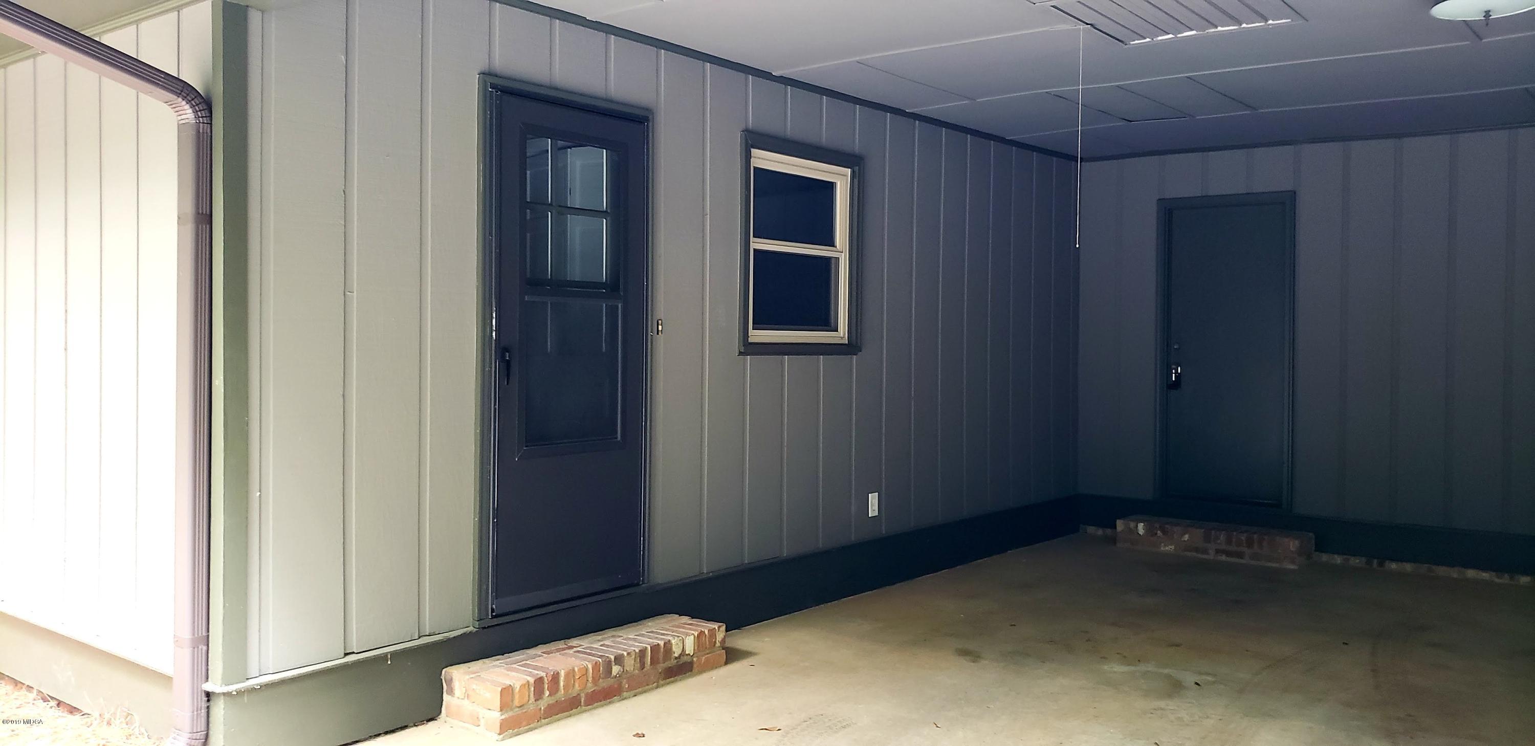 259 Greenwood Road Gray, GA 31032 - Photo 27 of 29 a room that has a bed in it