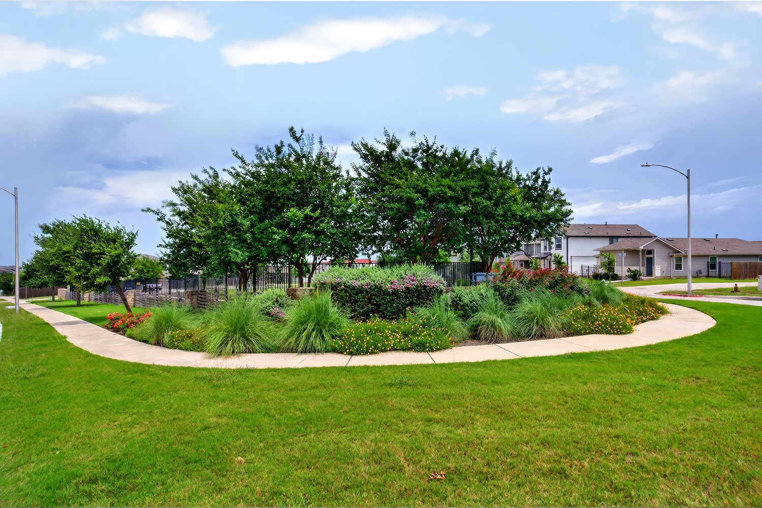 2006 Grow Lane Austin, TX 78754 - Photo 40 of 40 A vibrant green lawn and well-maintained shrubbery define this appealing neighborhood park space.
