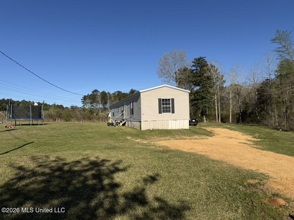 1404 Gene Road Southwest Bogue Chitto, MS 39629 - Photo 5 of 18 E86CED33-0E0D-459D-9293-9B69B1DB2F57_1_1
