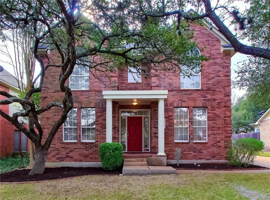 10514 Redmond Road Austin, TX 78739 - Photo 1 of 1 a front view of a house with garden