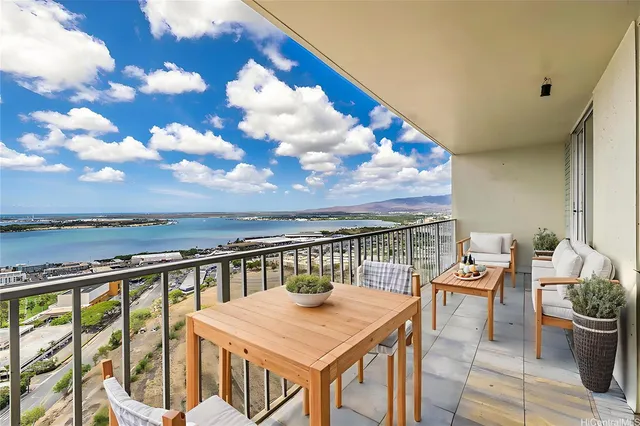 a view of a balcony with chairs