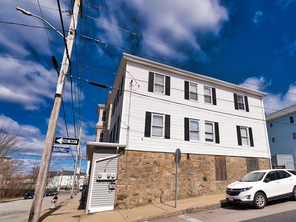 232 Alden Street Fall River, MA 02723 - Photo 2 of 34 a car parked in front of a building