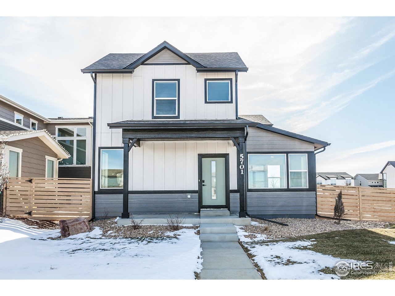 5701 Stone Fly Drive Timnath, CO 80547 - Photo 2 of 48 a view of a house with a yard