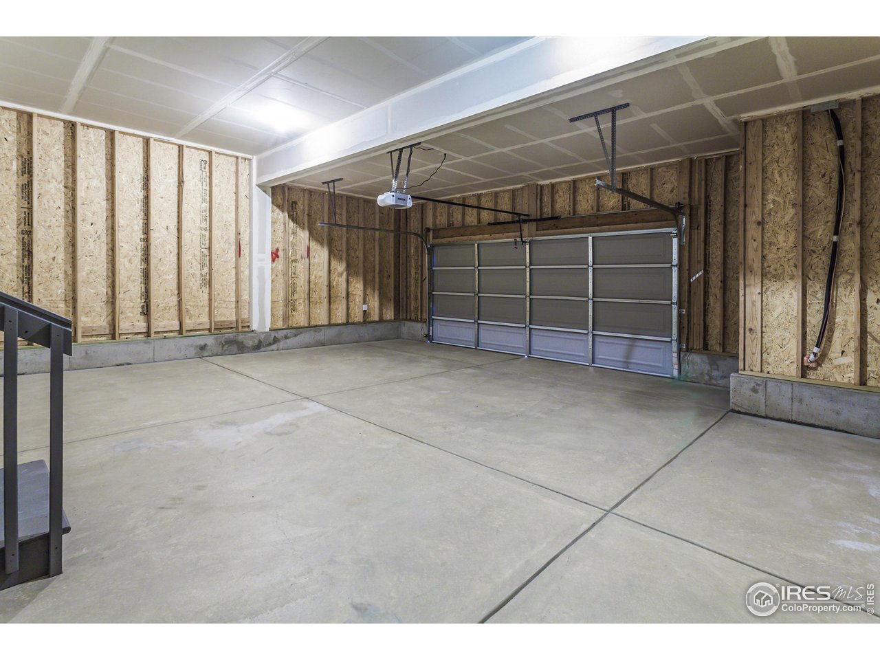 5701 Stone Fly Drive Timnath, CO 80547 - Photo 21 of 48 a view of empty room with wooden floor