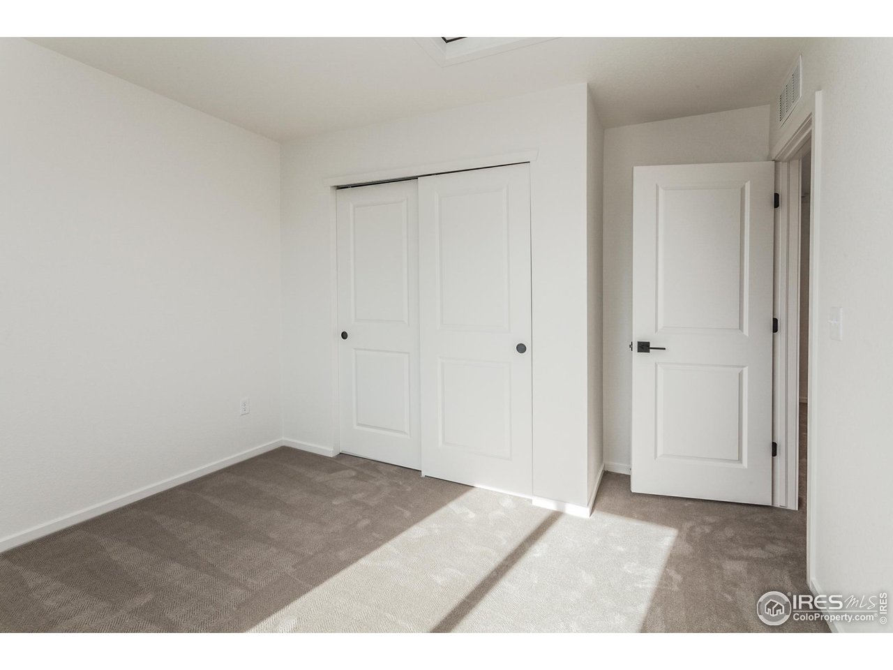 5701 Stone Fly Drive Timnath, CO 80547 - Photo 27 of 48 a view of an empty room