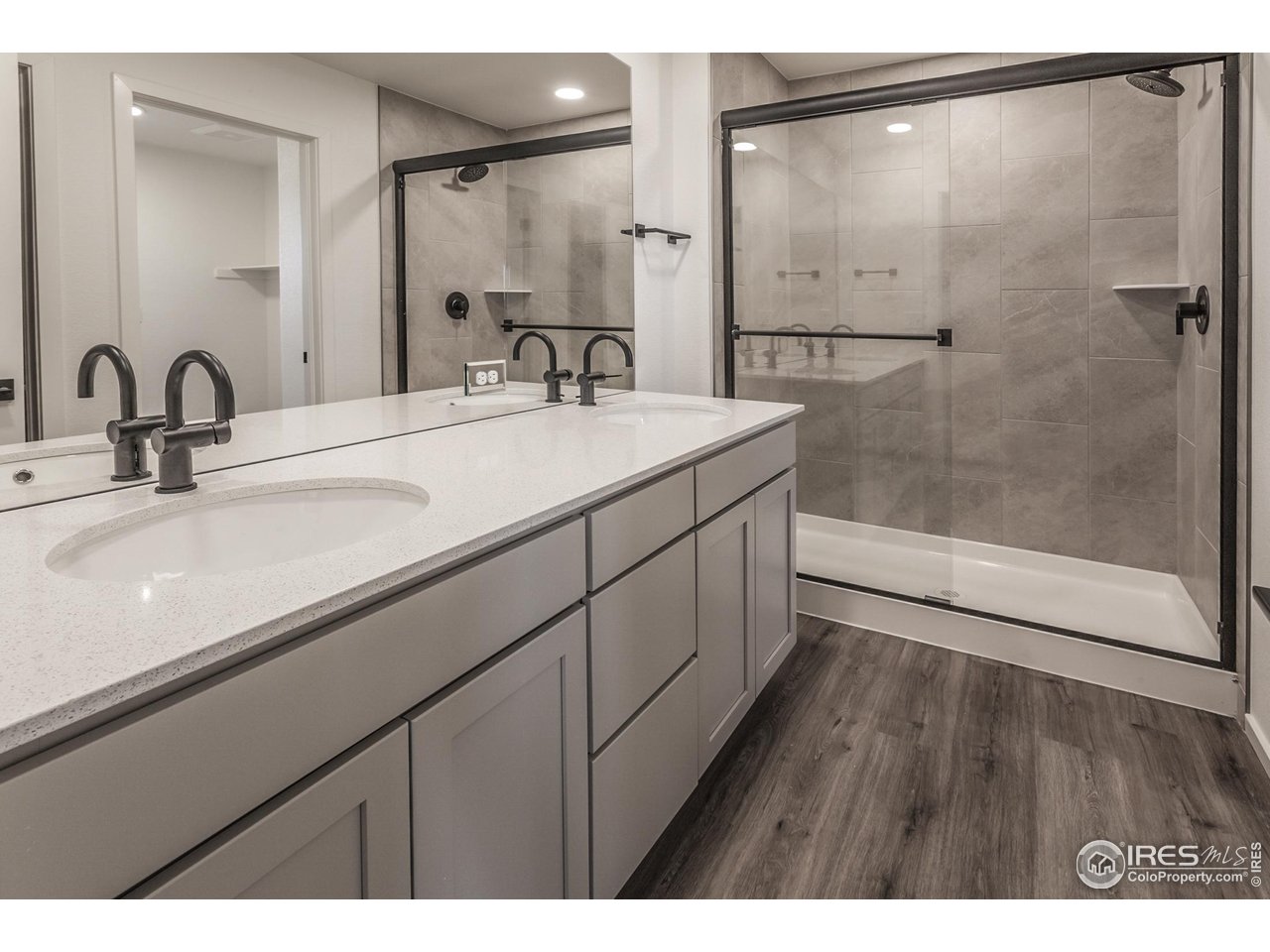 5701 Stone Fly Drive Timnath, CO 80547 - Photo 33 of 48 a bathroom with a sink and a mirror