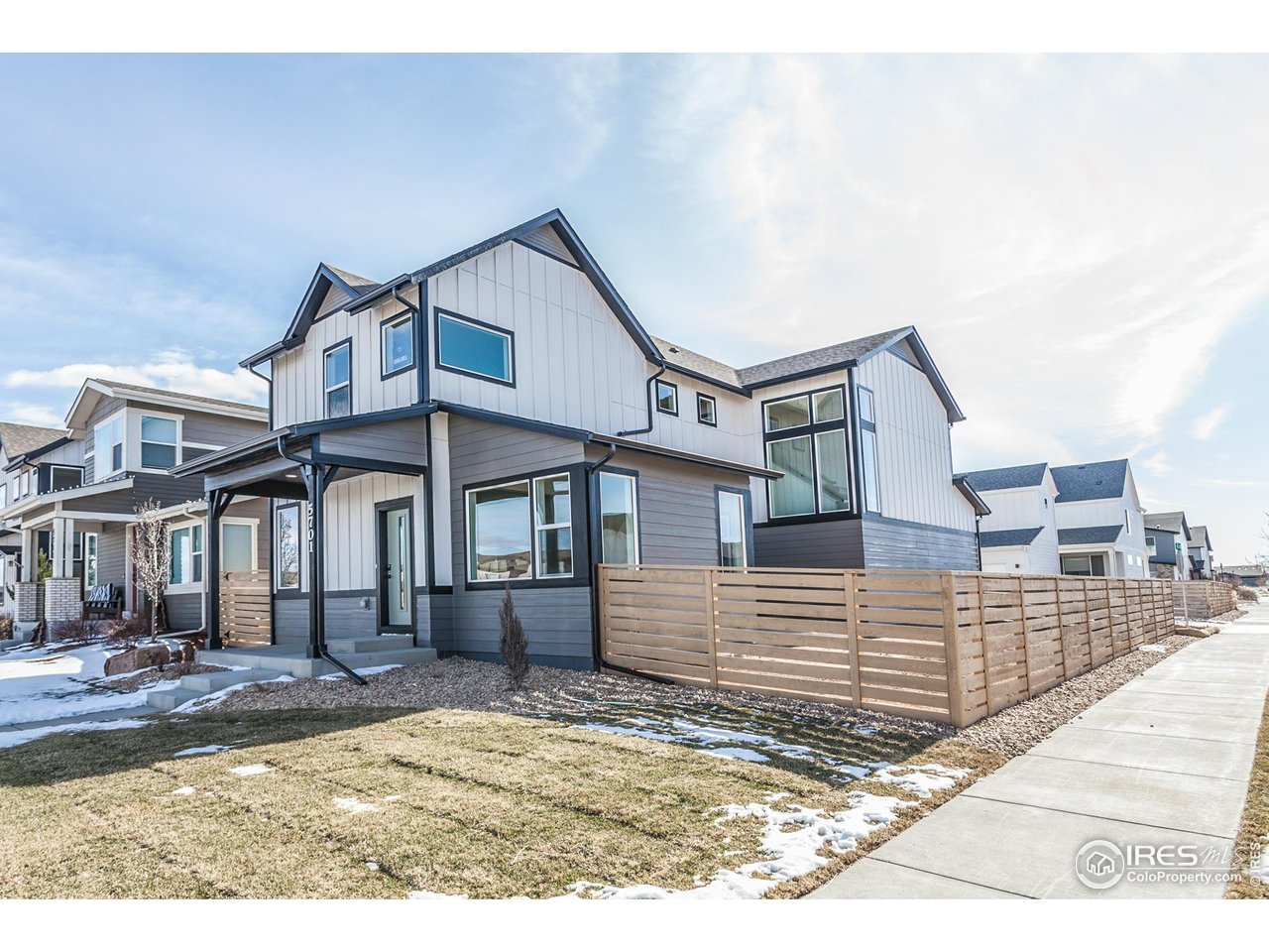 5701 Stone Fly Drive Timnath, CO 80547 - Photo 4 of 48 a view of a building with a yard