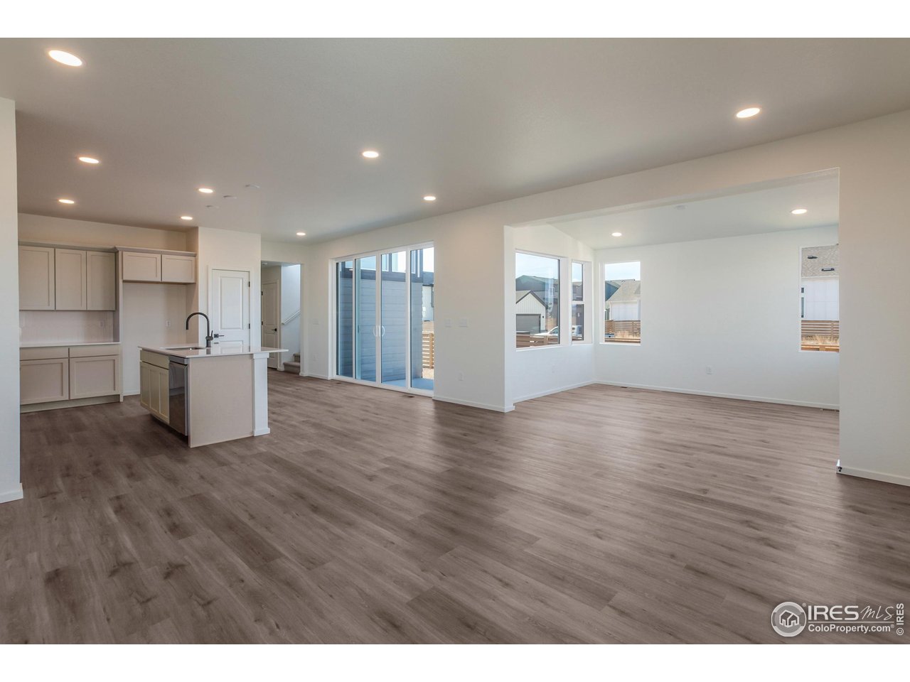 5701 Stone Fly Drive Timnath, CO 80547 - Photo 5 of 48 a view of a kitchen with a dishwasher and a large window