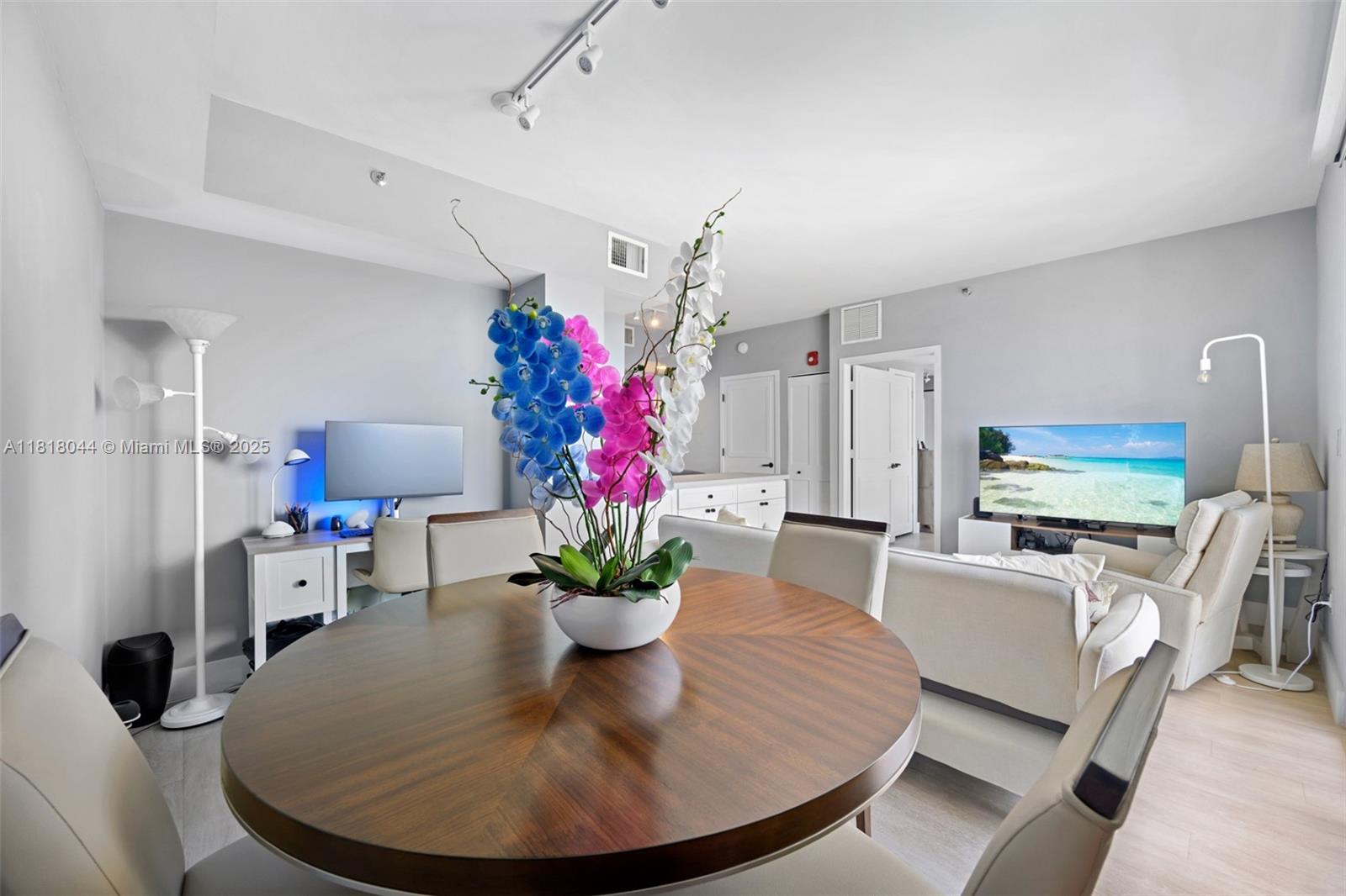 1621 Bay Road, Unit PH3 Miami Beach, FL 33139 - Photo 12 of 24 a view of a dining room with furniture