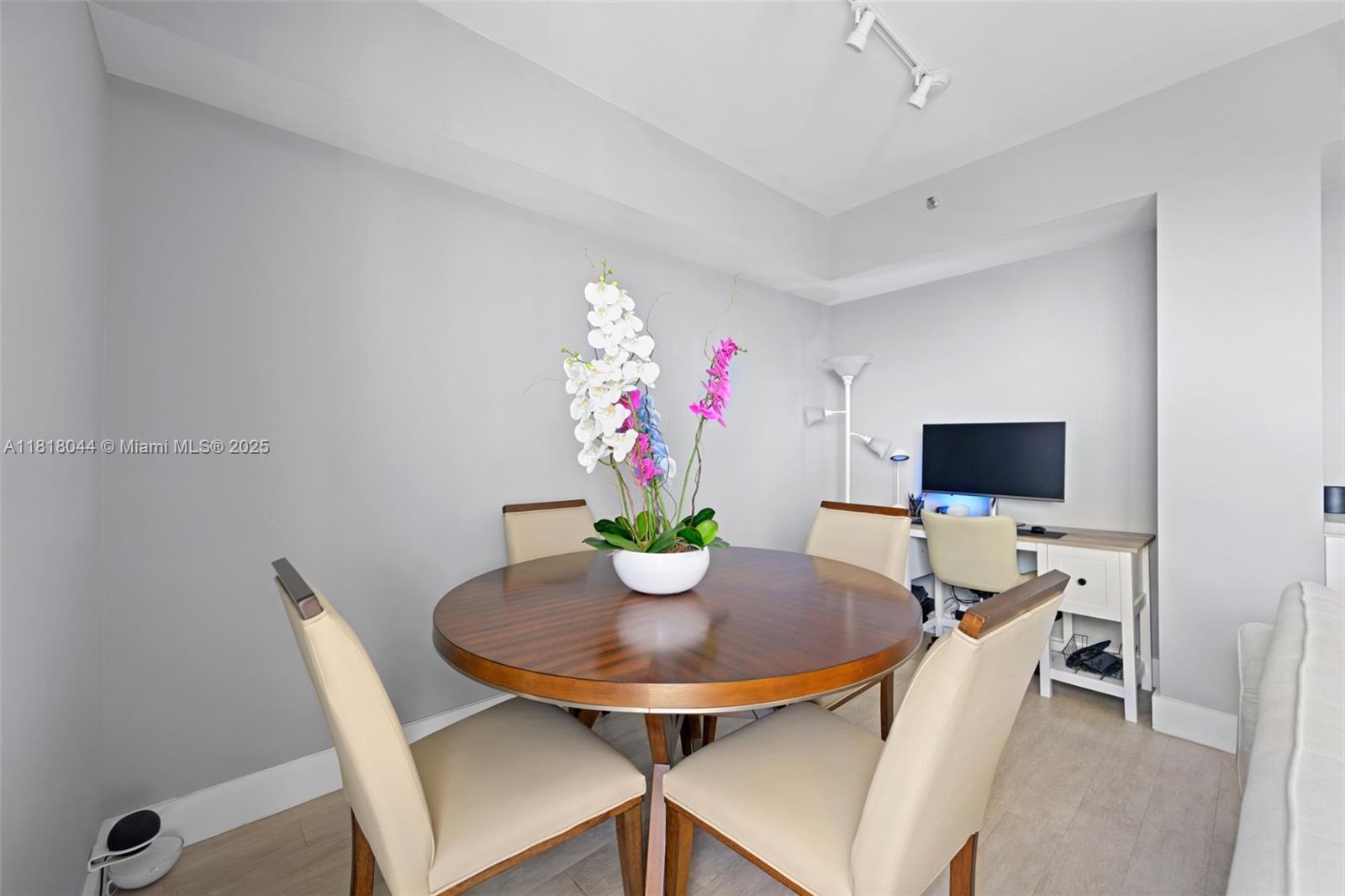 1621 Bay Road, Unit PH3 Miami Beach, FL 33139 - Photo 24 of 24 a view of a dining room with furniture