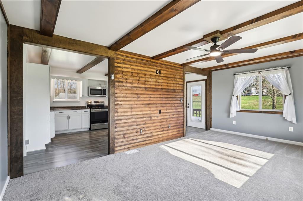 223 Diamond Road Grove City, PA 16127 - Photo 6 of 25 a view of a hallway with a kitchen