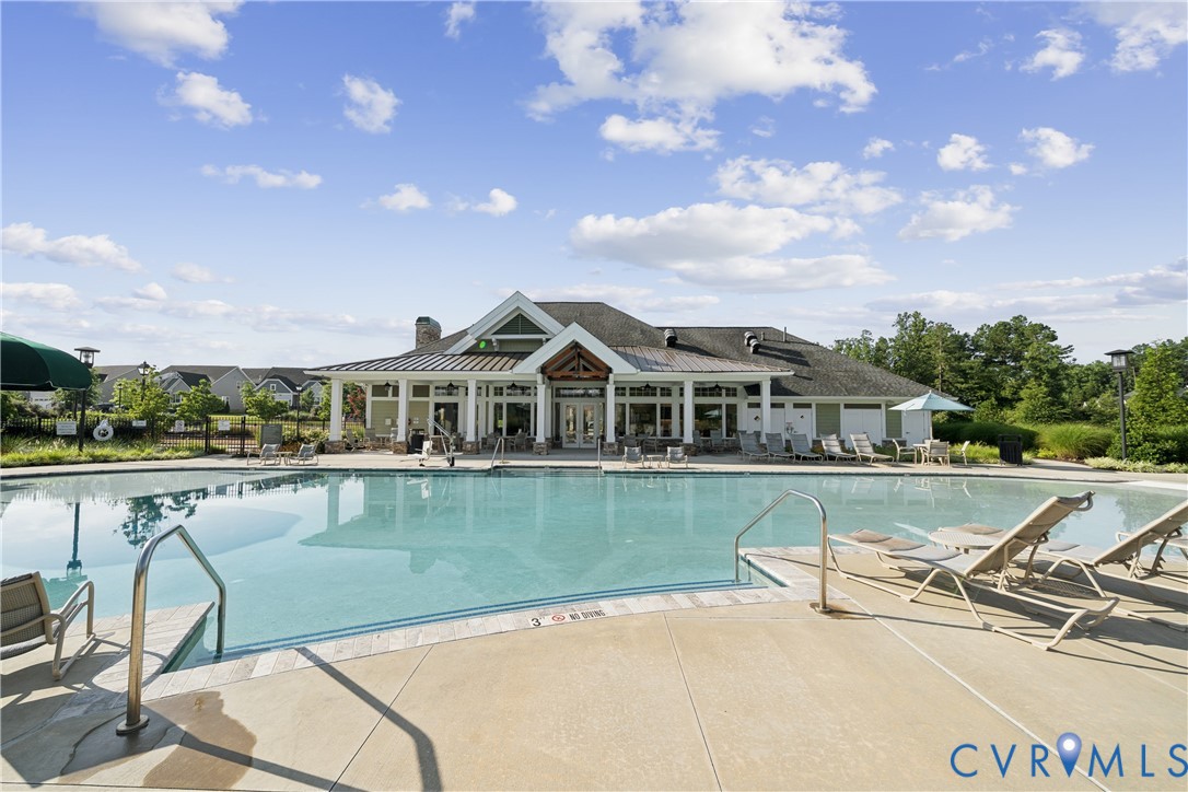 19007 Palisades Ridge Moseley, VA 23120 - Photo 16 of 21 a front view of a house with swimming pool having outdoor seating
