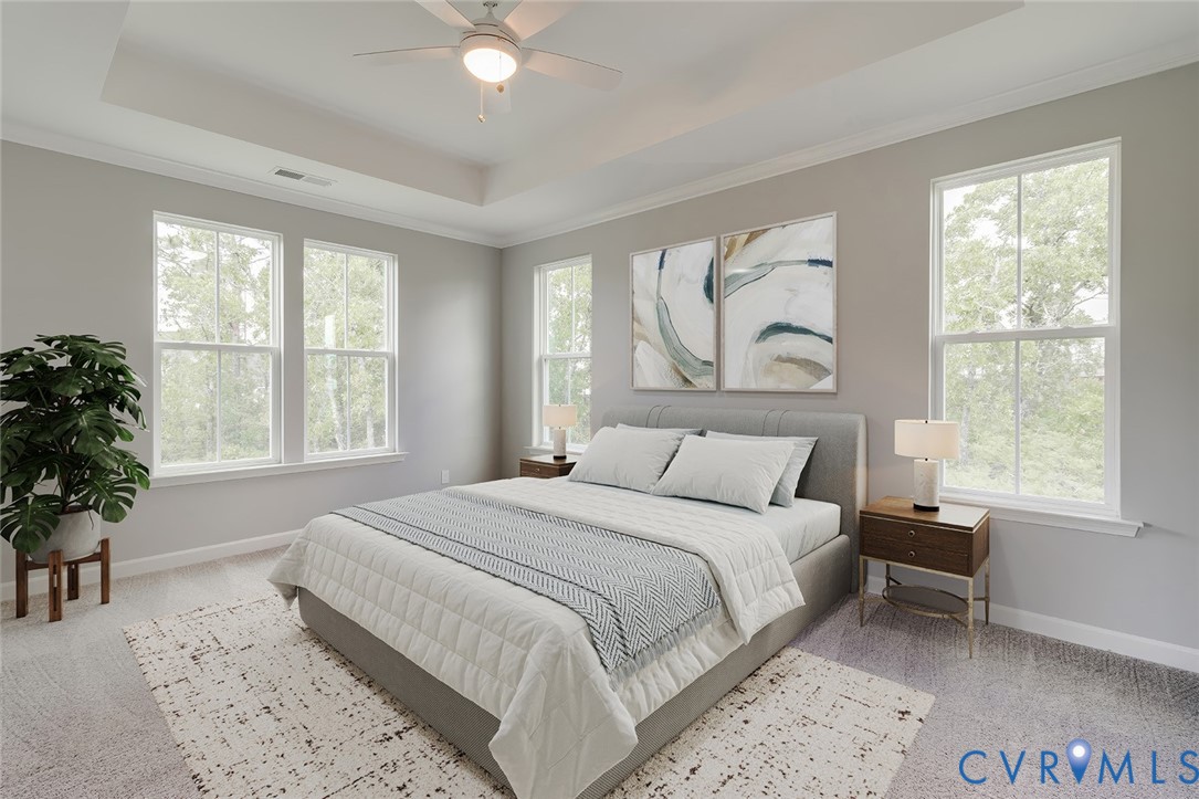 19007 Palisades Ridge Moseley, VA 23120 - Photo 8 of 21 a bedroom with a large bed and a large window