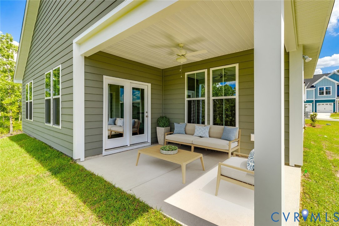 19007 Palisades Ridge Moseley, VA 23120 - Photo 10 of 21 a balcony with furniture and a garden