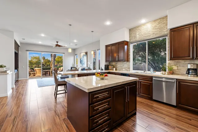 a kitchen with a stove and a cabinets