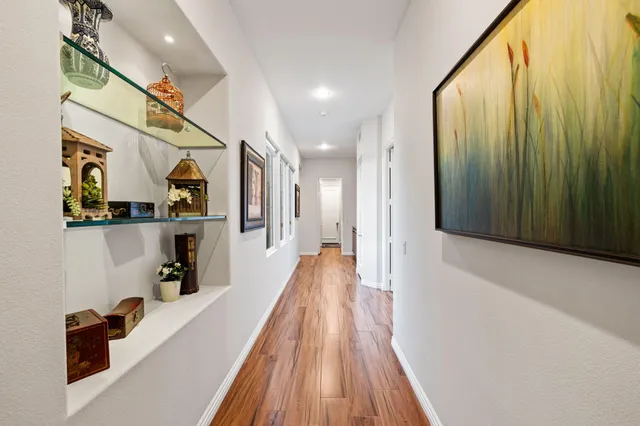 a utility room with cabinets washer and dryer