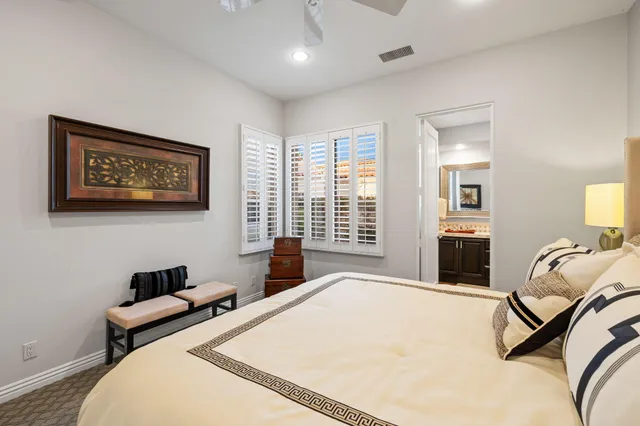 a view of a chairs and table in the patio