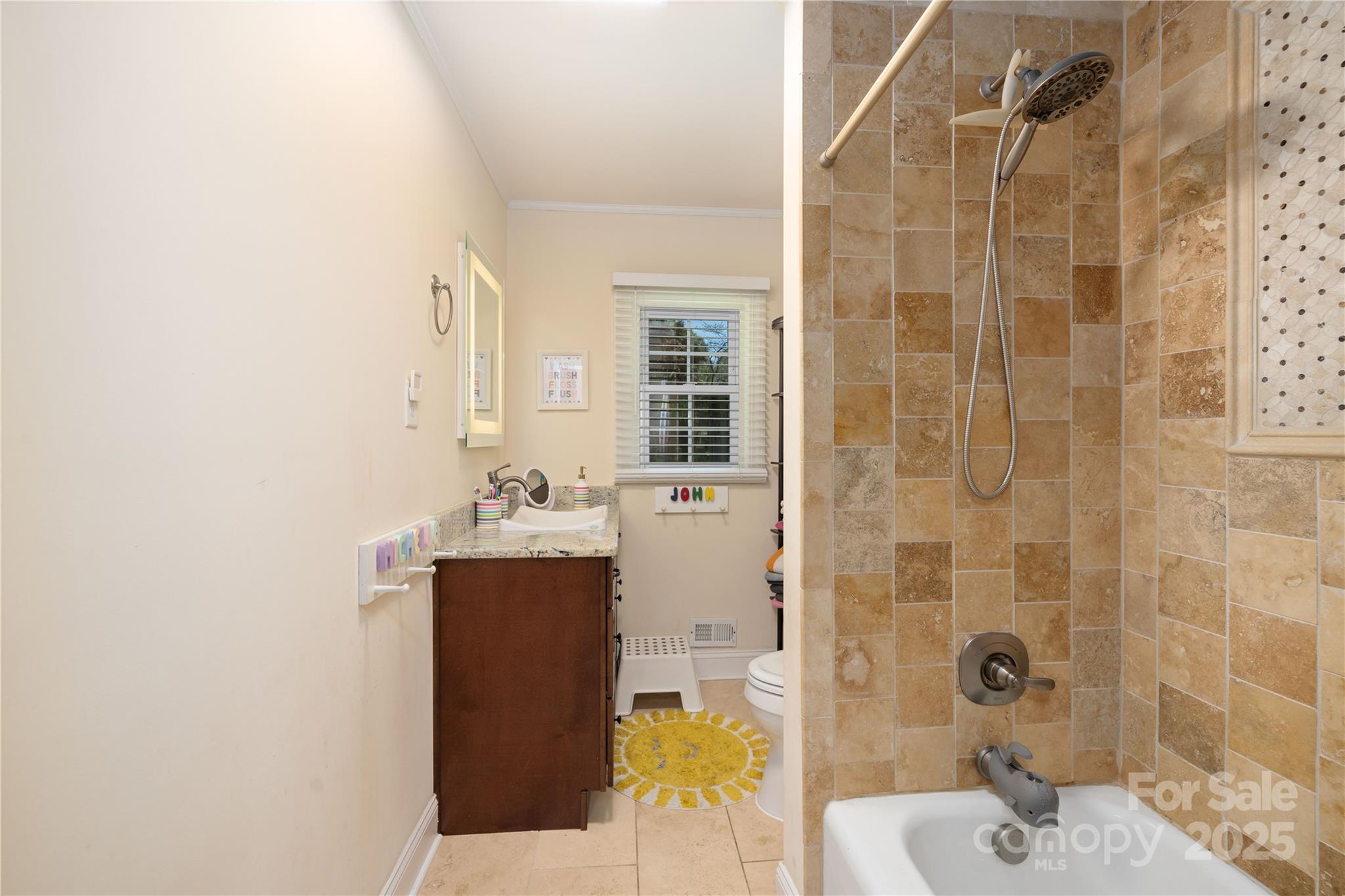 5431 Park Road Charlotte, NC 28209 - Photo 18 of 26 a bathroom with a sink and mirror
