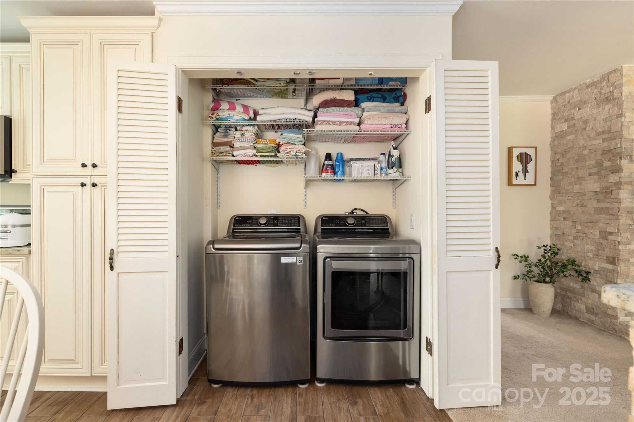 5431 Park Road Charlotte, NC 28209 - Photo 21 of 26 a kitchen with stainless steel appliances and cabinets