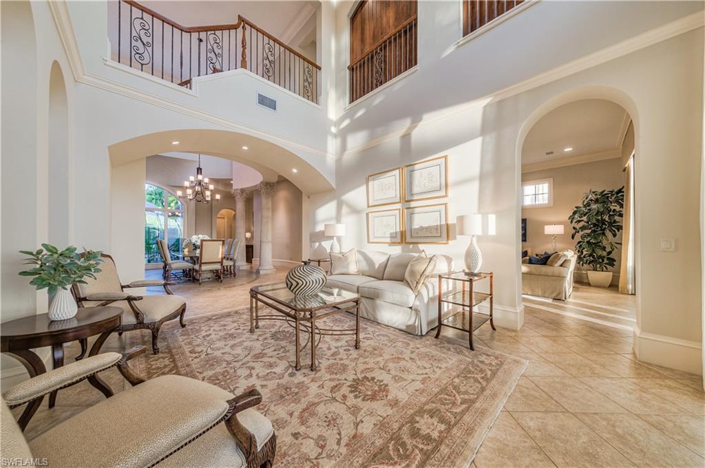 2829 Capistrano Way Naples, FL 34105 - Photo 15 of 35 a living room with furniture