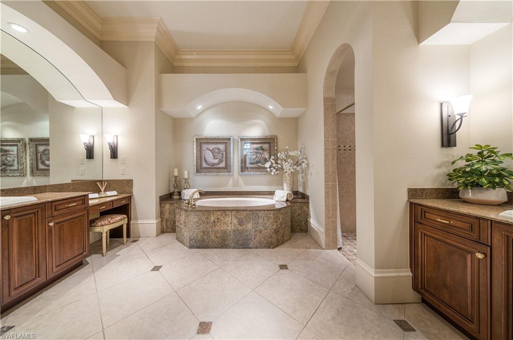 2829 Capistrano Way Naples, FL 34105 - Photo 18 of 35 a large white kitchen with a large stove