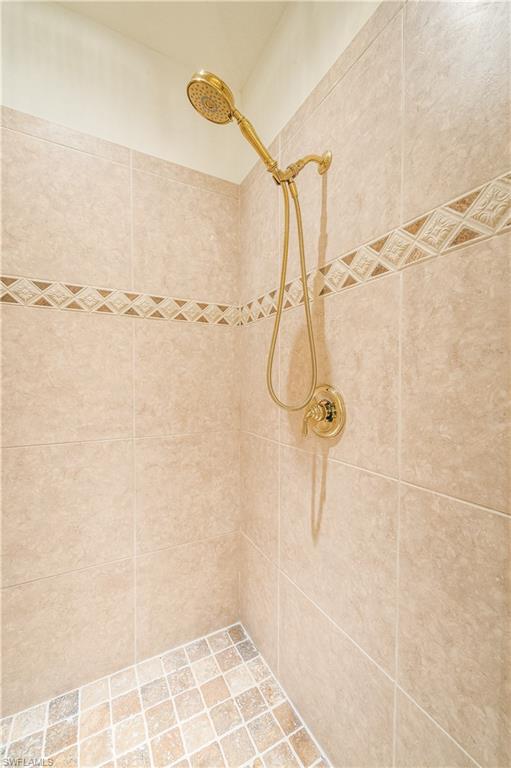 2829 Capistrano Way Naples, FL 34105 - Photo 20 of 35 a bathroom with a shower