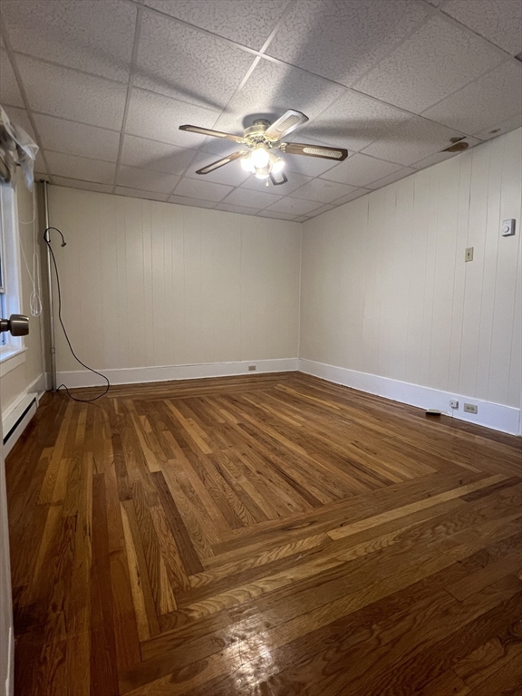 20 Sherwin Street, Unit A Ware, MA 01082 - Photo 9 of 10 en empty room with wooden floor and fan