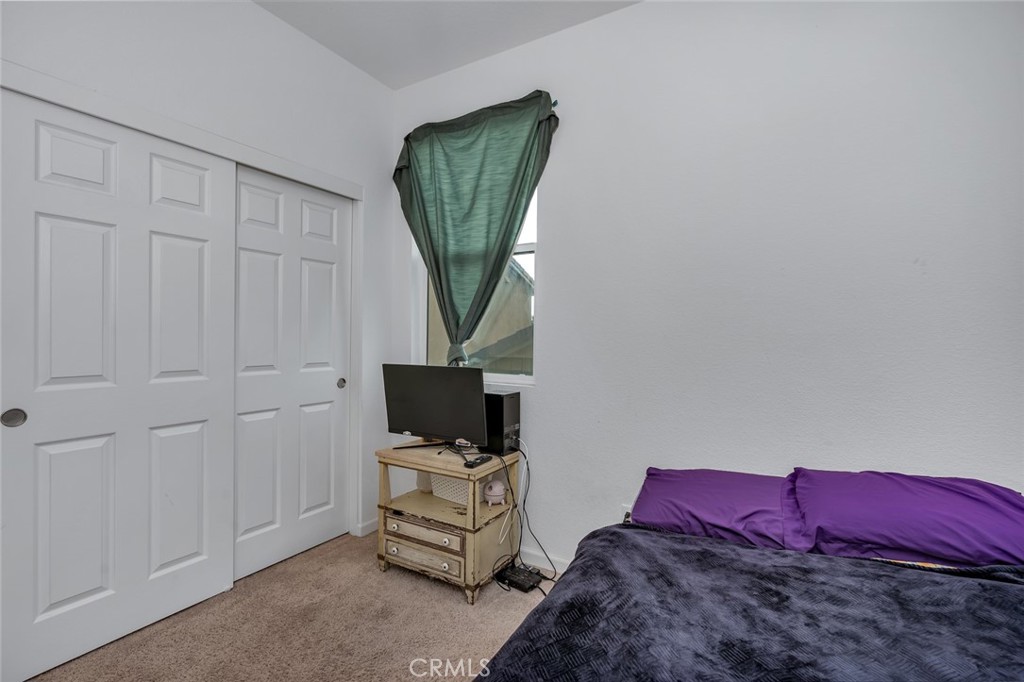 2936 Dillon Lane Merced, CA 95348 - Photo 18 of 34 a room with furniture and a flat screen tv