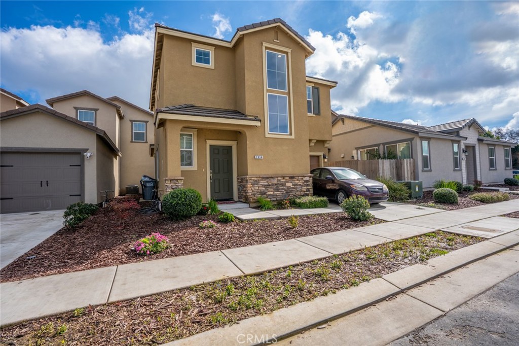 2936 Dillon Lane Merced, CA 95348 - Photo 2 of 34 a front view of a house with a yard